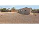 Exterior view of a well maintained home with low maintenance landscaping, rock ground cover, and a fenced in yard at 1709 W Clarendon Ave, Phoenix, AZ 85015