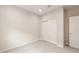 Neutral bedroom featuring carpeted floor and closet with sliding doors at 17843 W Encinas Ln, Goodyear, AZ 85338