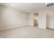 A well-lit main bedroom features neutral carpet and an en-suite bathroom with a glass-enclosed shower at 17843 W Encinas Ln, Goodyear, AZ 85338