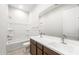 Bright bathroom featuring double sink vanity with a bathtub and shower combination at 18166 E Colt Dr, Queen Creek, AZ 85142
