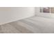 Bedroom featuring neutral carpet, baseboards, and a window for natural light at 18166 E Colt Dr, Queen Creek, AZ 85142