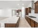 Spacious kitchen with a large island, stainless steel appliances, and plenty of counter space at 18166 E Colt Dr, Queen Creek, AZ 85142