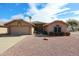 Charming single-story home featuring desert landscaping, a two-car garage, and a well-maintained exterior at 19507 N 90Th Ln, Peoria, AZ 85382