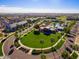 Aerial view showcasing the community park and amenities in a beautiful setting at 21141 W Main St, Buckeye, AZ 85396