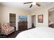 Bedroom featuring an ensuite bathroom and walk-in closet at 21141 W Main St, Buckeye, AZ 85396