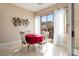 Dining area with a sliding glass door and views of the outdoor patio and backyard at 21141 W Main St, Buckeye, AZ 85396