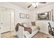 Cozy bedroom featuring a daybed, ceiling fan, and decor at 22412 N 20Th Pl, Phoenix, AZ 85024