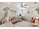 Upstairs living area with neutral decor, lots of natural light, and a comfortable seating area at 22412 N 20Th Pl, Phoenix, AZ 85024