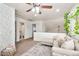 Loft-style living area with neutral decor, lots of natural light, and access to a bathroom at 22412 N 20Th Pl, Phoenix, AZ 85024