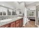 Bathroom featuring double sinks and access to the bedroom at 2404 W Muirfield Dr, Anthem, AZ 85086