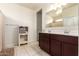 Well-lit bathroom with tile floors, vanity, and neutral color scheme at 28916 N Selenite Ln, San Tan Valley, AZ 85143