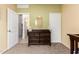 Bedroom with a dresser, vanity with mirror and two doorways at 28916 N Selenite Ln, San Tan Valley, AZ 85143