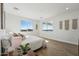 Bedroom with two windows allowing natural light to illuminate the room at 35597 W Jones Ave, Tonopah, AZ 85354