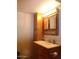 Bathroom featuring a vanity cabinet with a sink and lights above at 409 S Mountain View Dr, Kearny, AZ 85137