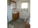 Bathroom with a shower and modern wooden vanity at 409 S Mountain View Dr, Kearny, AZ 85137