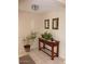 Warm and inviting entryway showcasing tile flooring and a wooden console table at 409 S Mountain View Dr, Kearny, AZ 85137