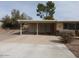 This home features convenient covered parking and tidy landscaping at 409 S Mountain View Dr, Kearny, AZ 85137