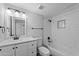 Bathroom featuring a subway tile shower, a single sink vanity, and modern fixtures at 5106 N 17Th Ave # 11, Phoenix, AZ 85015