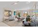 Inviting living room featuring stylish furnishings, artwork, and a sliding glass door to the balcony at 5132 N 31St Way # 144, Phoenix, AZ 85016