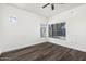 Bedroom with hardwood floors and large window for ample natural light at 600 W Grove Pkwy # 2188, Tempe, AZ 85283