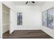 Cozy bedroom with hardwood floors, ample natural light, and a spacious closet at 600 W Grove Pkwy # 2188, Tempe, AZ 85283