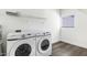 Clean, bright laundry room with modern Samsung washer and dryer and shelving at 600 W Grove Pkwy # 2188, Tempe, AZ 85283