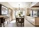 Bright dining area with French doors and view to a tranquil garden at 6221 E Vista Dr, Paradise Valley, AZ 85253