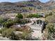 Beautiful hillside home with terracotta roof, pool, mature landscaping, and mountain views at 6221 E Vista Dr, Paradise Valley, AZ 85253