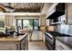 Beautiful kitchen featuring modern appliances and stone countertops with a breakfast nook at 6221 E Vista Dr, Paradise Valley, AZ 85253