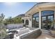 The rooftop patio boasts comfortable seating, a fire pit, and stunning views; great for entertaining and relaxation at 6221 E Vista Dr, Paradise Valley, AZ 85253