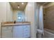 Bathroom featuring tiled shower and bathtub combination at 7442 E Golden Eagle Cir, Gold Canyon, AZ 85118