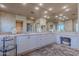 Bathroom with a large mirror and dual sinks set into the vanity at 7442 E Golden Eagle Cir, Gold Canyon, AZ 85118