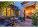 Relaxing courtyard with a stone fountain, colorful bougainvillea, and comfortable seating at 7442 E Golden Eagle Cir, Gold Canyon, AZ 85118