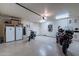 Large garage featuring epoxy floors and plenty of room for vehicles and storage at 7442 E Golden Eagle Cir, Gold Canyon, AZ 85118