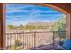 Scenic covered patio offers a beautiful landscape view of golf course and mountains at 7442 E Golden Eagle Cir, Gold Canyon, AZ 85118