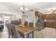 Open dining room with direct access to kitchen, making it a perfect space for dining and entertaining at 9501 W Hidden Valley Cir, Sun City, AZ 85351