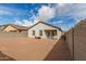 Expansive backyard offering endless possibilities for outdoor enjoyment and customization at 9509 W Illini St, Tolleson, AZ 85353