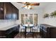 Cozy breakfast nook area with a stylish table, chairs, and natural light at 9517 W Cedar Hill Cir # N, Sun City, AZ 85351