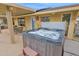 Backyard hot tub with a patio and view of the pool area at 9517 W Cedar Hill Cir # N, Sun City, AZ 85351