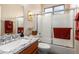 Bathroom featuring granite counters, modern fixtures, and a frosted glass shower door at 9617 E Holiday Way, Sun Lakes, AZ 85248