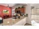 Well-lit kitchen featuring granite countertops and stainless steel appliances at 9617 E Holiday Way, Sun Lakes, AZ 85248