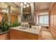 Elegant bathroom featuring granite countertops, dual sinks, and stylish cabinets at 9962 E Groundcherry Ln, Scottsdale, AZ 85262