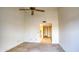 Bedroom featuring a ceiling fan with access to a bathroom at 10236 E Minnesota Ave, Sun Lakes, AZ 85248