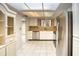 Bright kitchen with stainless steel appliances and a skylight for natural light at 10236 E Minnesota Ave, Sun Lakes, AZ 85248