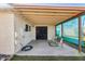 Back patio featuring a covered area and outdoor seating at 10324 N 97Th Dr # B, Peoria, AZ 85345