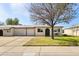 Charming single-story home features a neat front yard, driveway, and a single-car garage at 10324 N 97Th Dr # B, Peoria, AZ 85345
