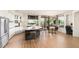 Bright open kitchen with stainless appliances, stone countertops, and eat-in breakfast area at 10687 E Fernwood Ln, Scottsdale, AZ 85262