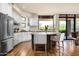 Beautiful open kitchen with granite countertops, stainless steel appliances, ample cabinet space and a cozy breakfast bar at 10687 E Fernwood Ln, Scottsdale, AZ 85262