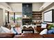 Living room with a floor to ceiling slate fireplace at 10687 E Fernwood Ln, Scottsdale, AZ 85262