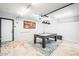 Game room with pool table, overhead lighting, decorative rug, and painted floor at 11215 N 37Th Ave, Phoenix, AZ 85029